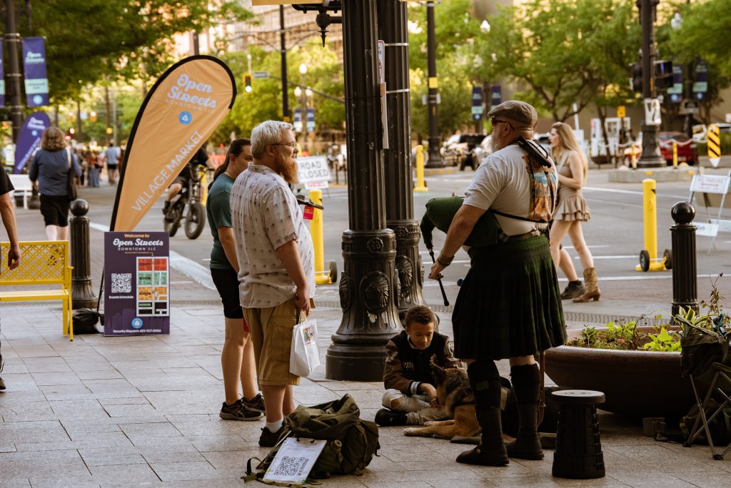 A Bagpiper performs at the Open Streets festival in downtown Salt Lake City, June 2025.